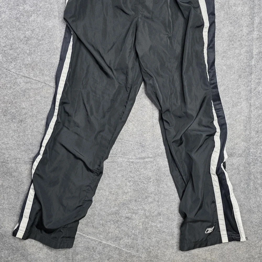Reebok Pants‎ Mens Large Black Track Warm Up Athletic Side Stripe Zip Hem Lined